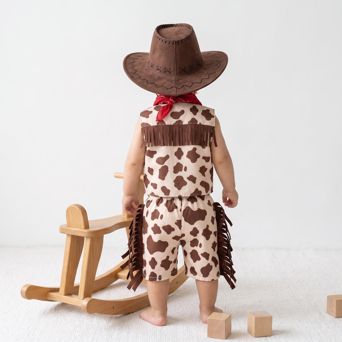 Toddler cowboy costume with cow print fringed vest, chaps pants and red bandana — photo 10