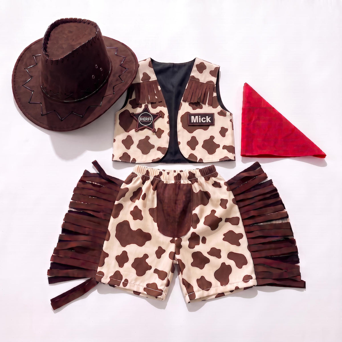 Toddler cowboy costume with cow print fringed vest, chaps pants and red bandana — photo 3