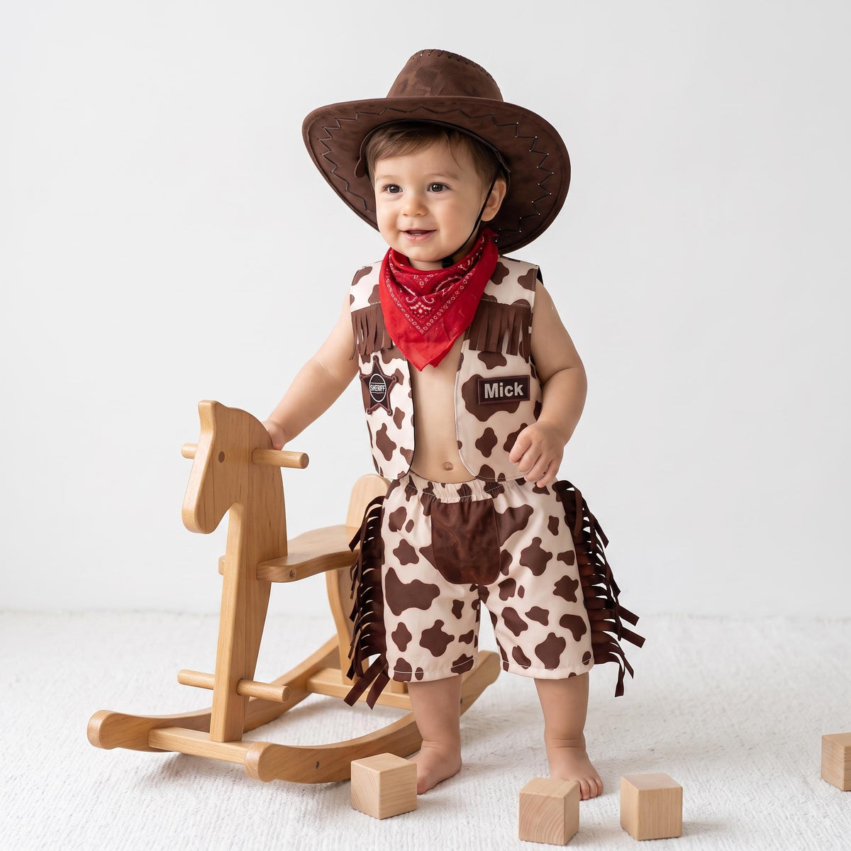 Toddler cowboy costume with cow print fringed vest, chaps pants and red bandana — photo 2